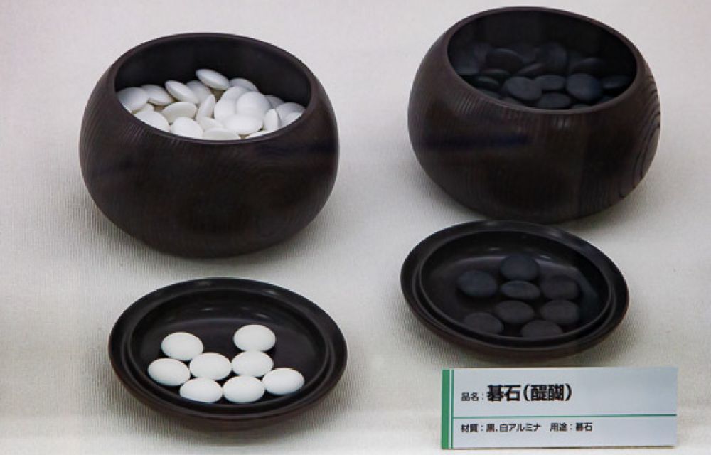 White and black ceramic stones for the board game Go