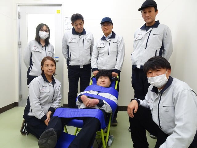 Employees participating in an evacuation drill using the Carrydan