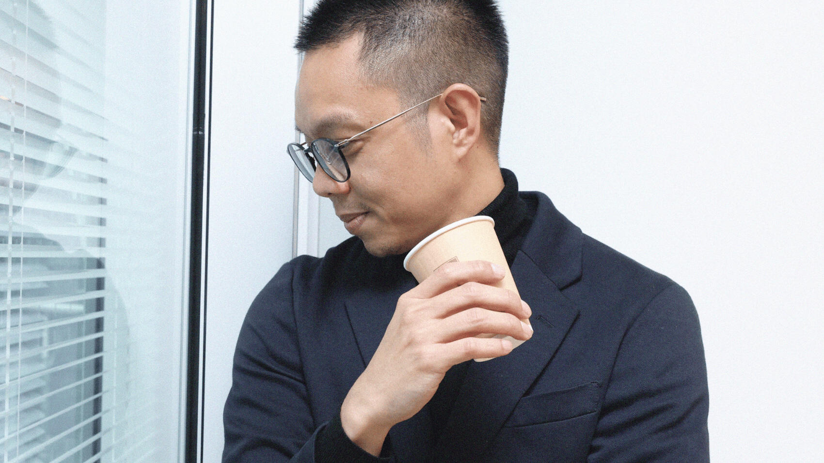 Erwin speaking while gazing at the upper right